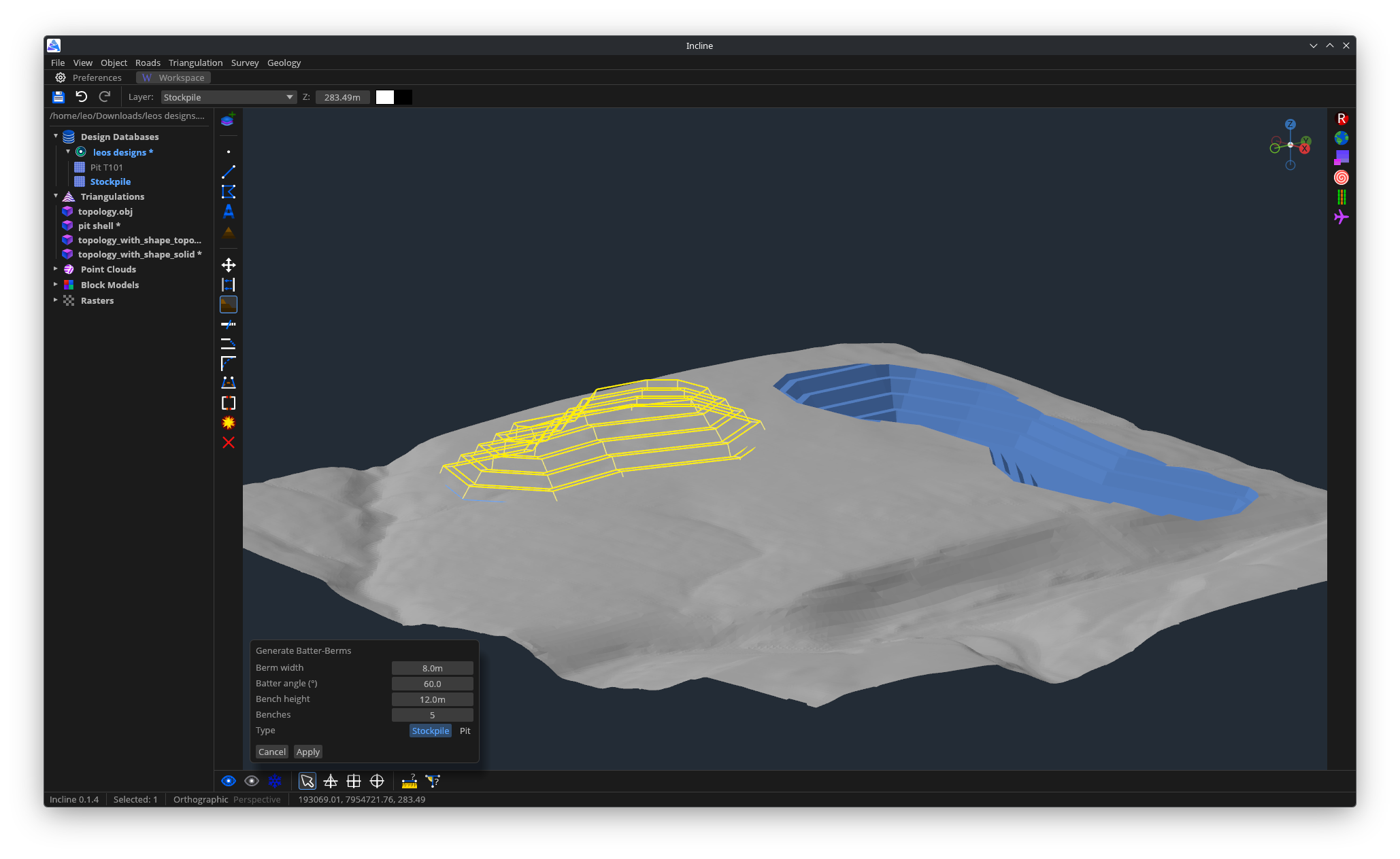 Incline displaying open-pit and stockpile designs over a triangulated mine surface.